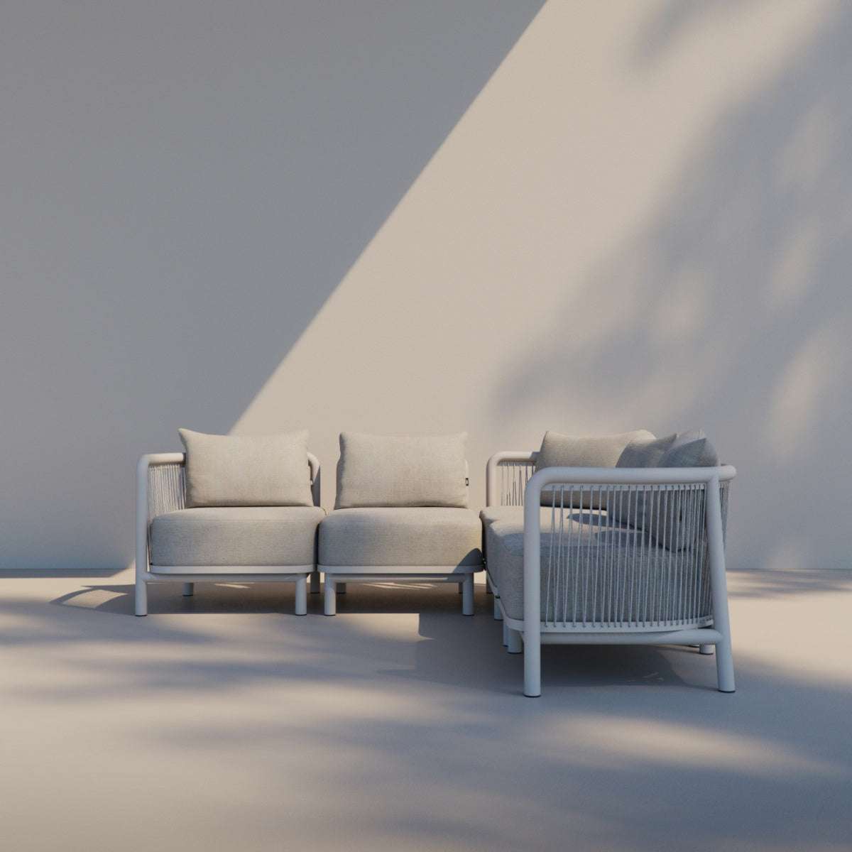 Kirra Lounge Sofa corner module in sand color with powder-coated aluminum frame and Olefin textile cushions outdoors