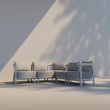 Kirra Lounge Sofa corner module in sand color with powder-coated aluminum frame and olefin cushions outdoors