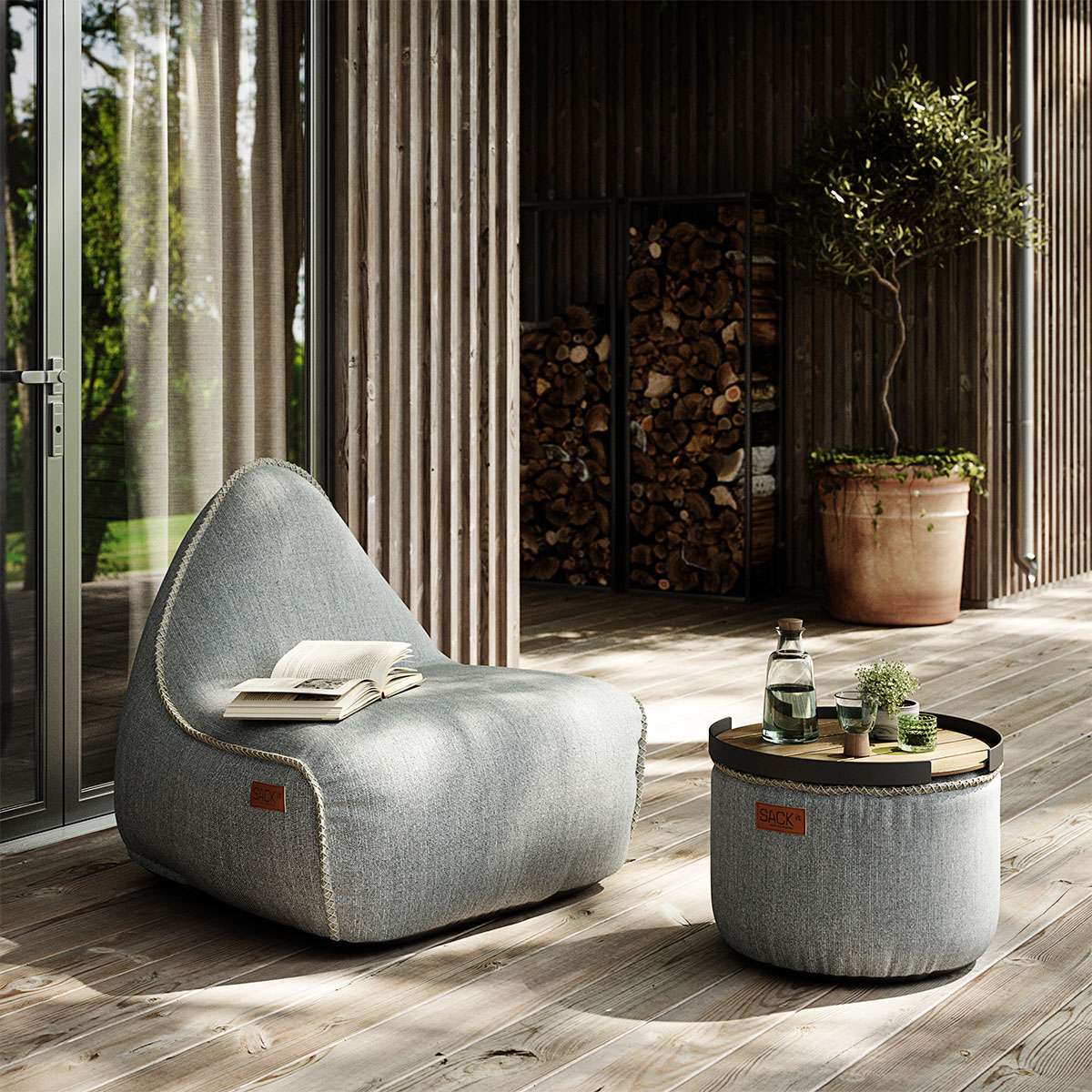 Cobana Lounge Chair in sand melange with linen stitches, soft rounded shape and low backrest.