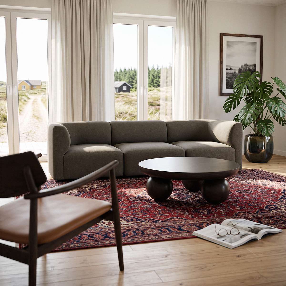 sackit europe Fjord three seater sofa with soft curves in a calm Scandinavian living room beside a round coffee table and patterned rug
