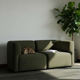Fjord Sofa corner section left in Cosmo Mustard fabric with soft rounded edges and Scandinavian design.