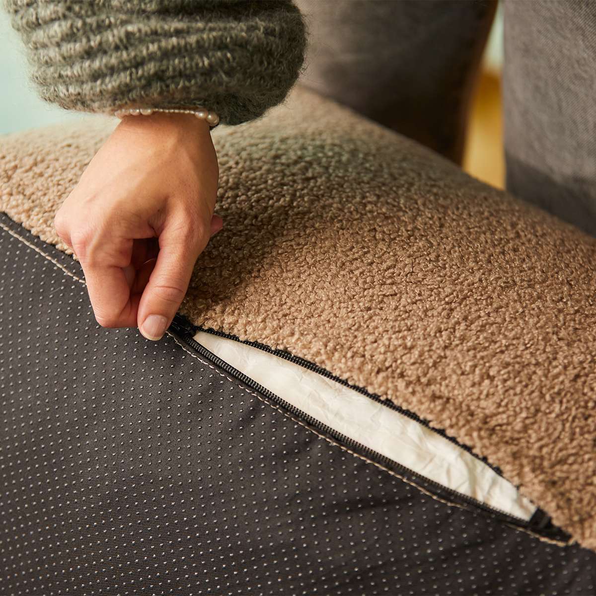 Soft Sofa Indoor seat with non-slip bottom in neutral fabric, simple modern design for indoor use.