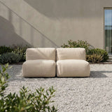 Soft Sofa Outdoor seat in beige boucle fabric with soft, rounded shape and low profile.