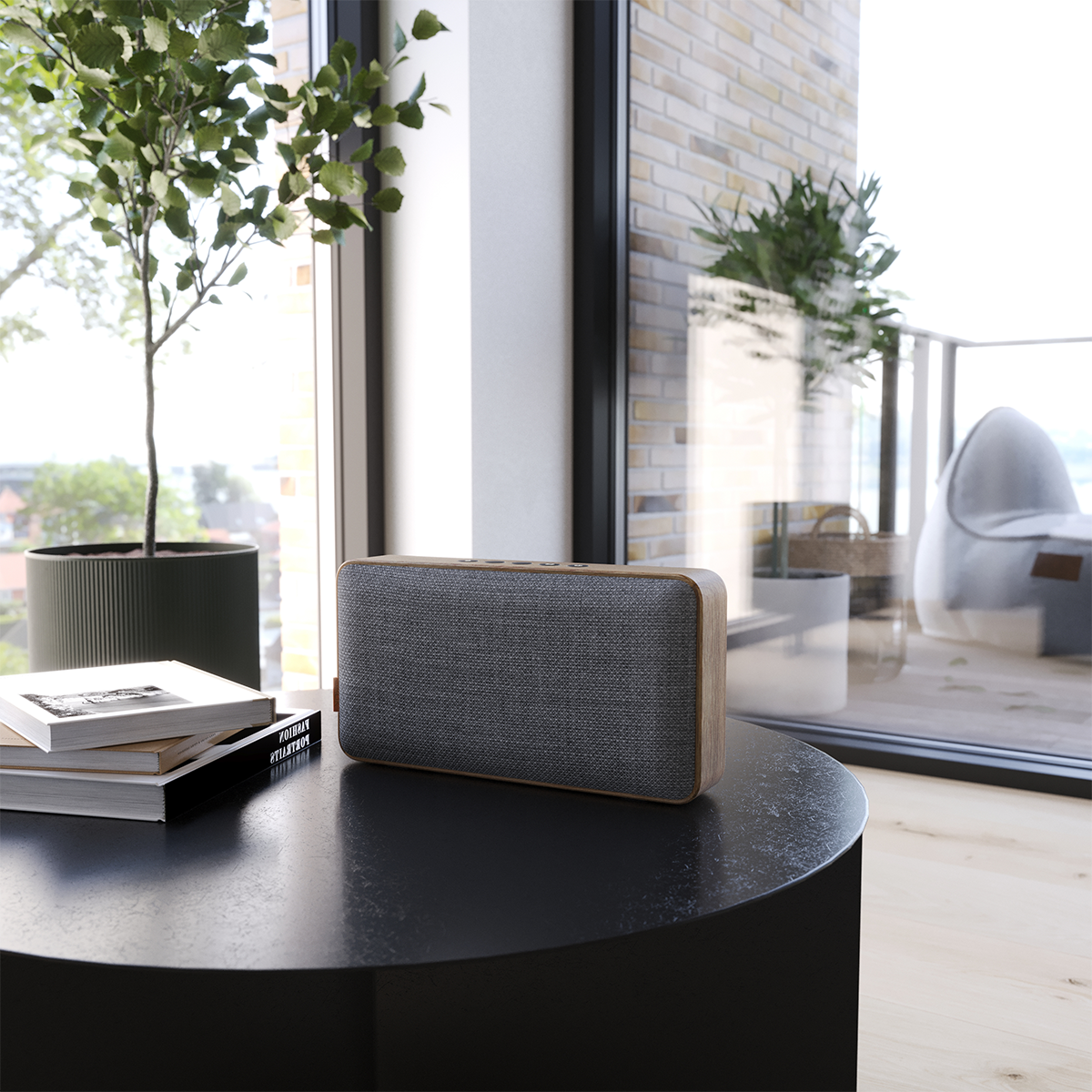 Move Wood Bluetooth speaker in natural oak with Fiord textile and brass details on a white background.