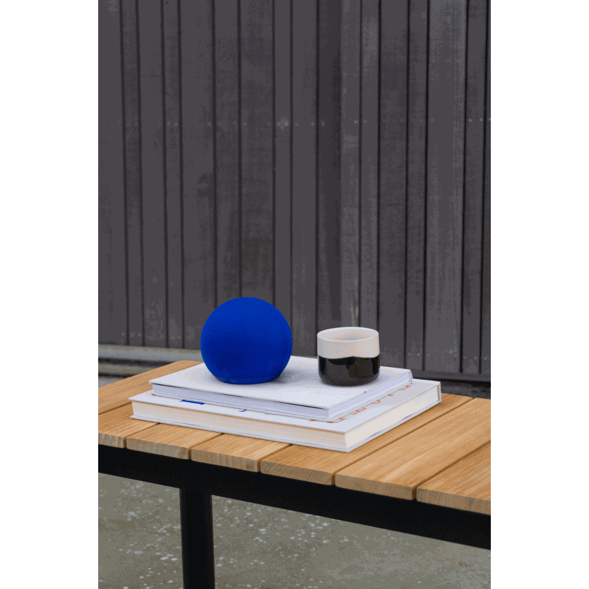 Compact Play Mini Bluetooth speaker with durable polyester textile and ABS housing in blue color.