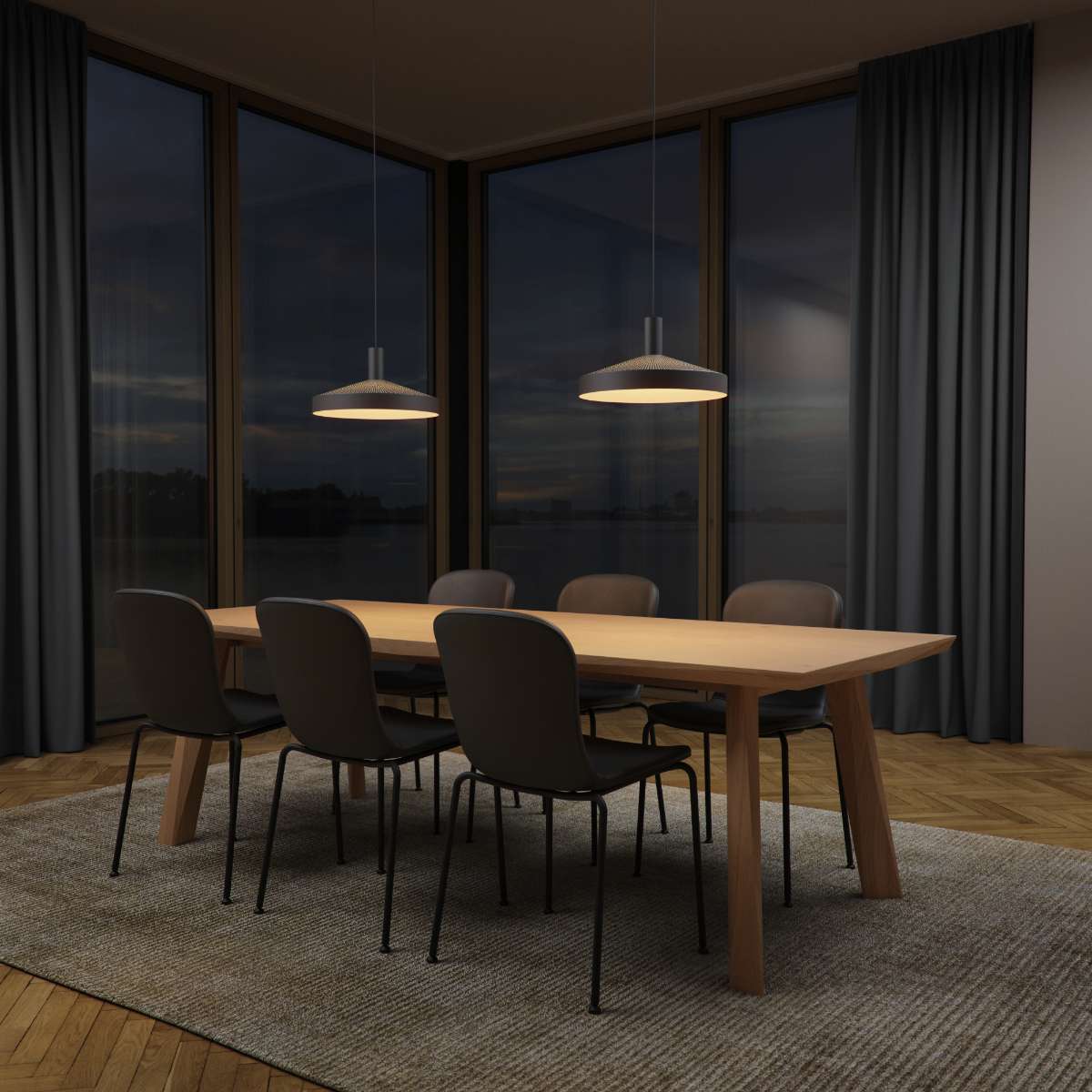 Black Dawn Pendant Ø40 with perforated top and white inner shade hanging indoors