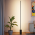 Black SACKit Expo 185 floor lamp with slim aluminum profile and marble base emitting soft upward light