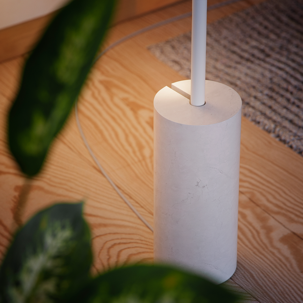 White SACKit Expo 185 floor lamp with slim aluminum profile and marble base, soft upward LED light strip