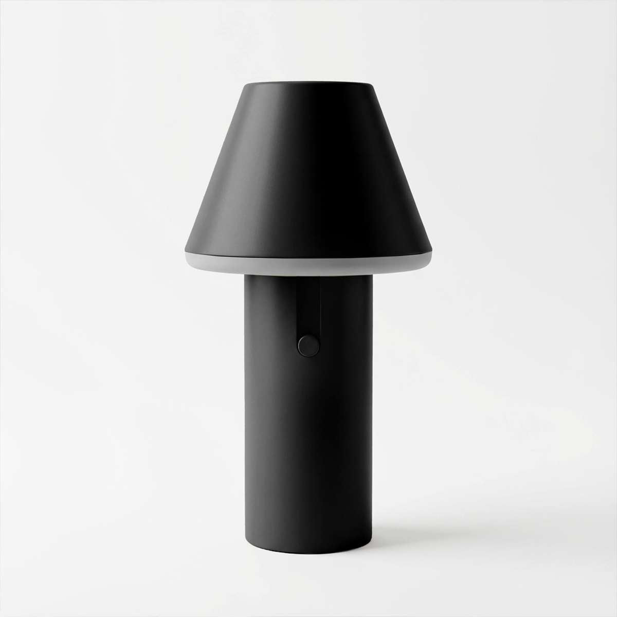 Black Cone cordless table lamp by sackit Europe with a cylindrical base and broad tapered shade for indoor and outdoor lighting