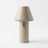 Beige cordless table lamp with a tapered shade and soft light diffuser for indoor or outdoor use by sackit