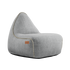 Light gray sackit Cobana lounge chair with a deep cushioned seat and high curved back on a black background