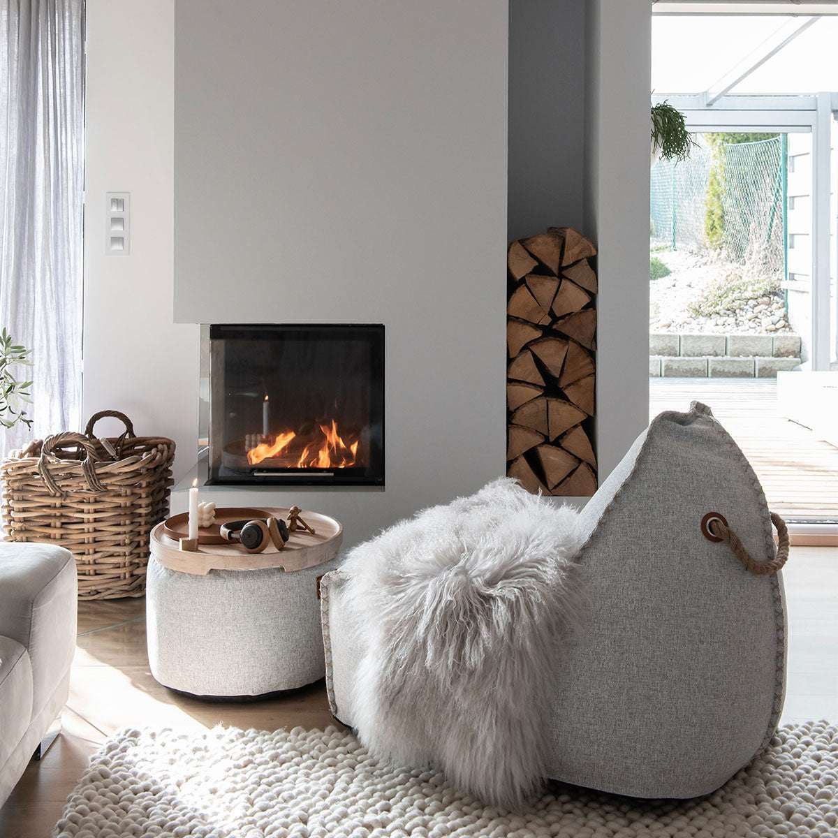 Cobana Grey pouf with rounded shape and textured fabric suitable for indoor and outdoor use