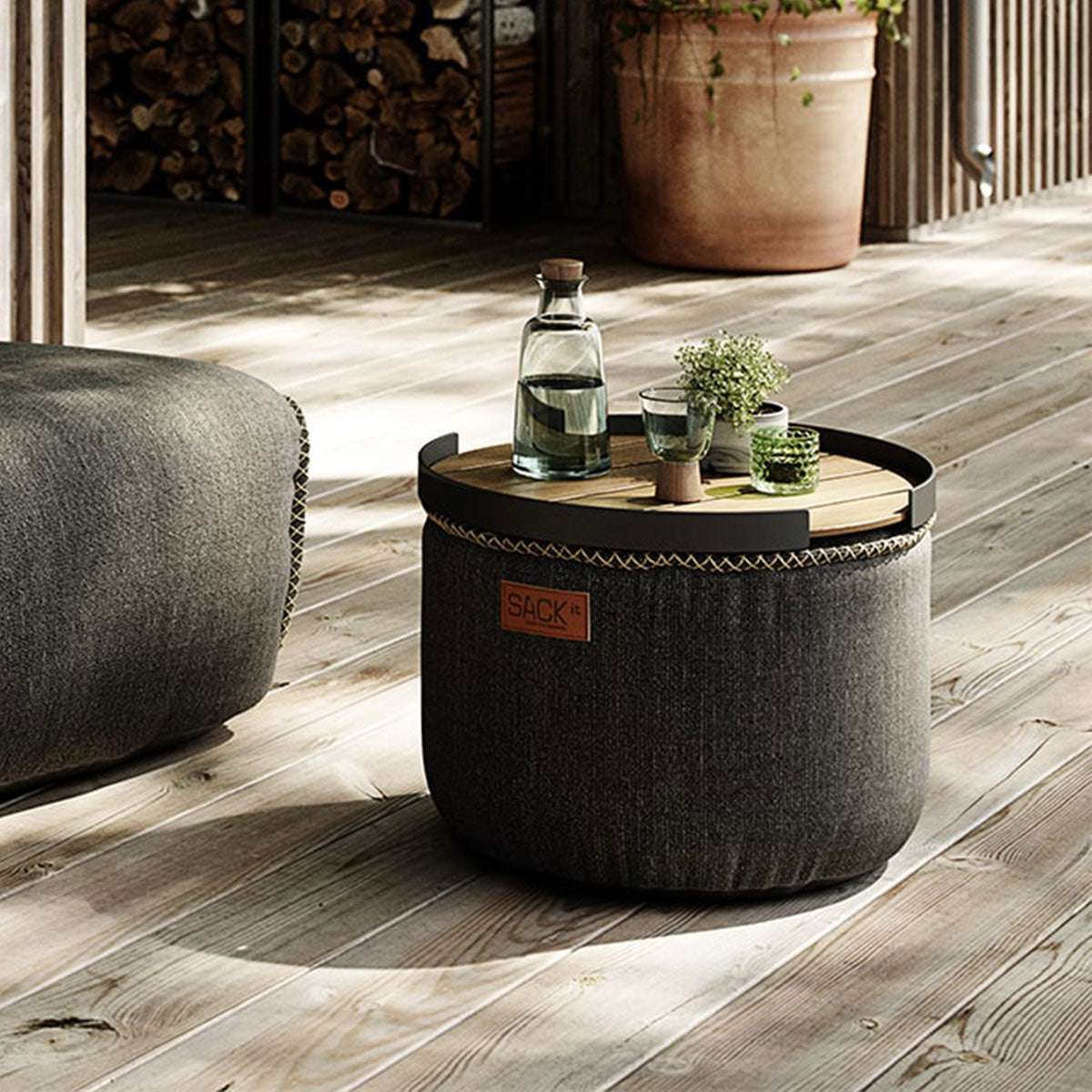 Cobana Grey pouf with durable fabric and hand-sewn stitches, suitable for indoor and outdoor use.