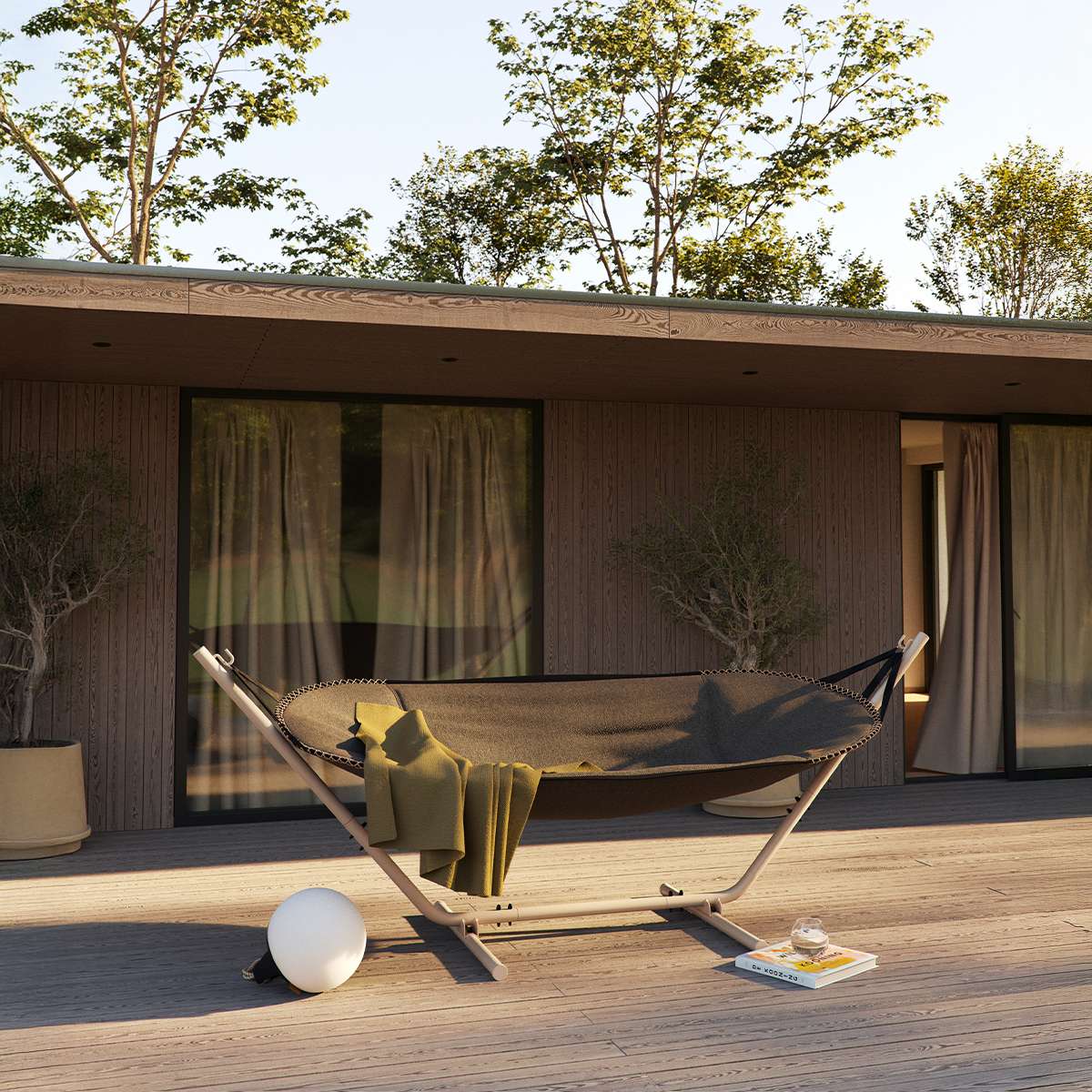 Cobana Hammock in cobana grey fabric with taupe powder-coated aluminum frame outdoors