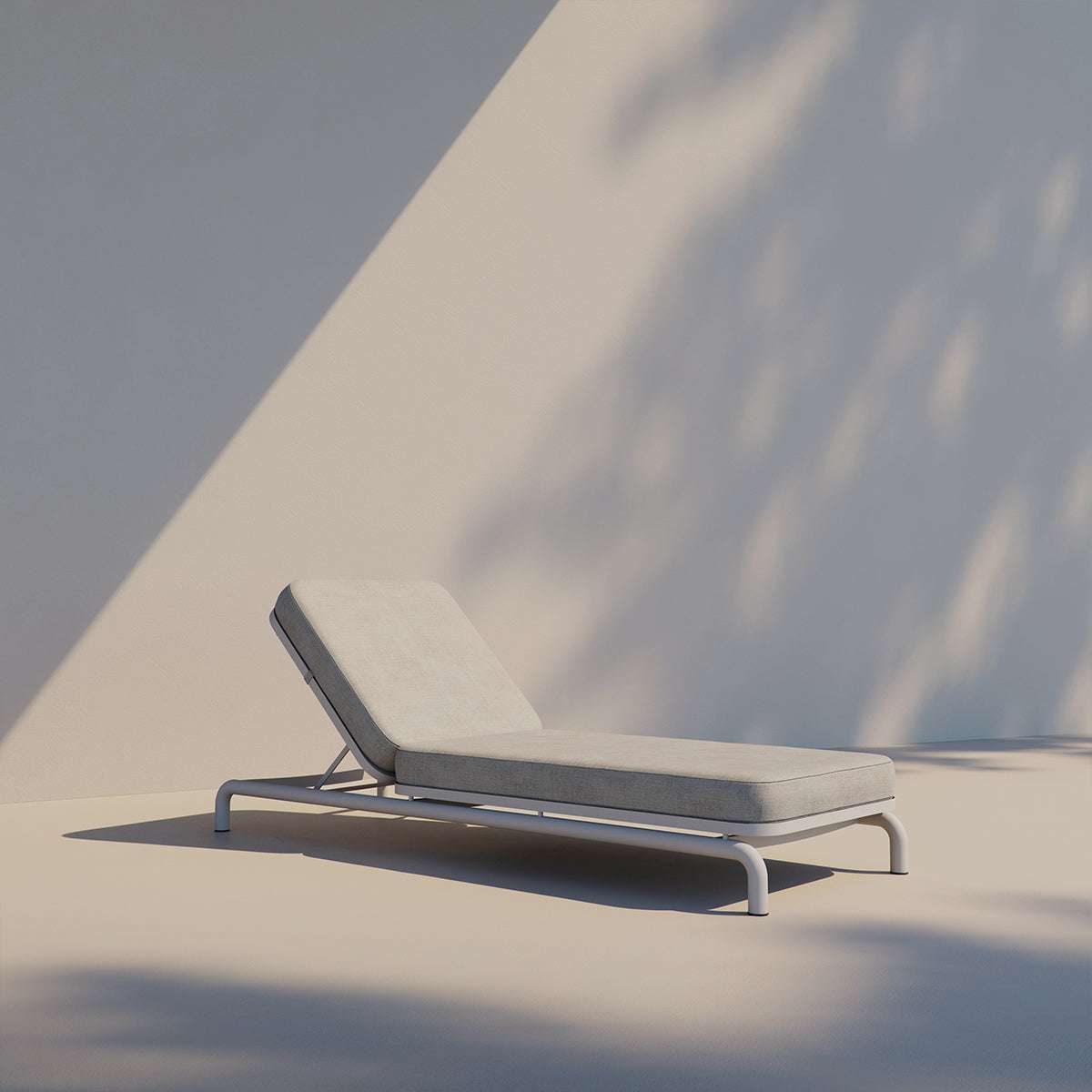 Kirra Sunbed in Kirra Sand color with adjustable backrest and powder-coated aluminum frame outdoors.