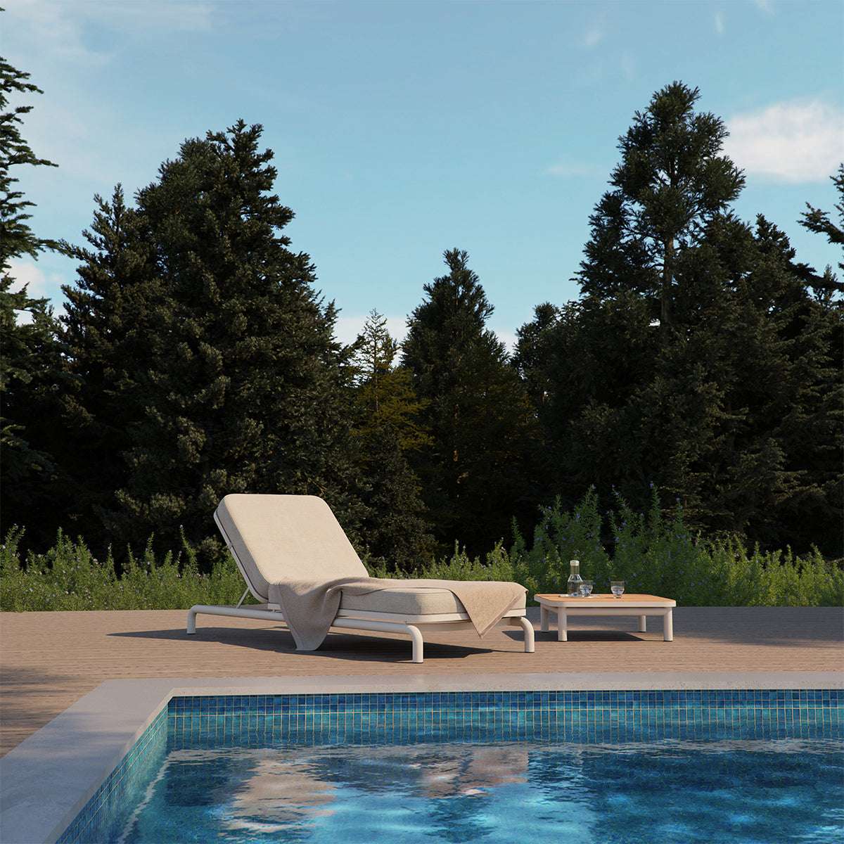 Kirra Sunbed in sand color with adjustable backrest and powder-coated aluminum frame outdoors