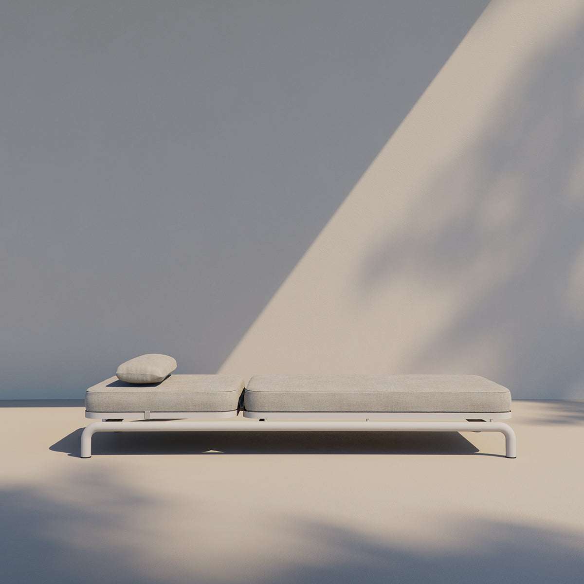 Kirra Sunbed in Kirra Sand color with adjustable backrest and powder-coated aluminum frame outdoors