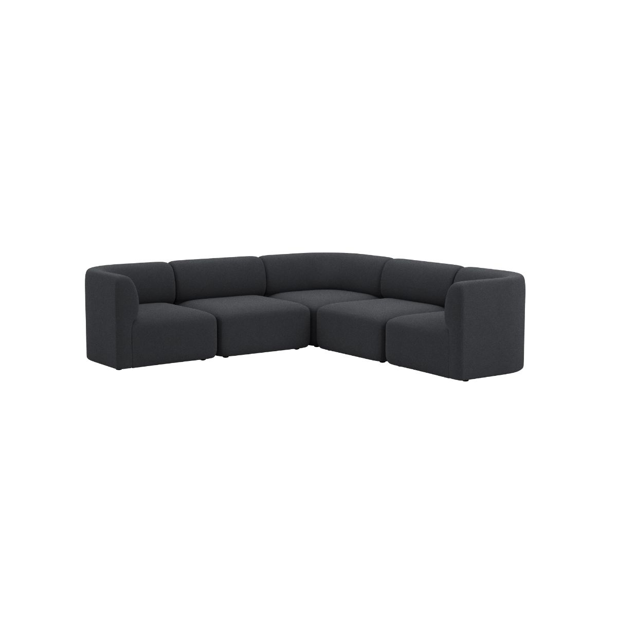 Dark gray Fjord corner sofa with deep cushions and rounded arms on a black background from sackit for contemporary Scandinavian interiors