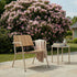 Kirra Patio Lounge Chair in taupe with powder-coated aluminum frame and teak wood seat outdoors