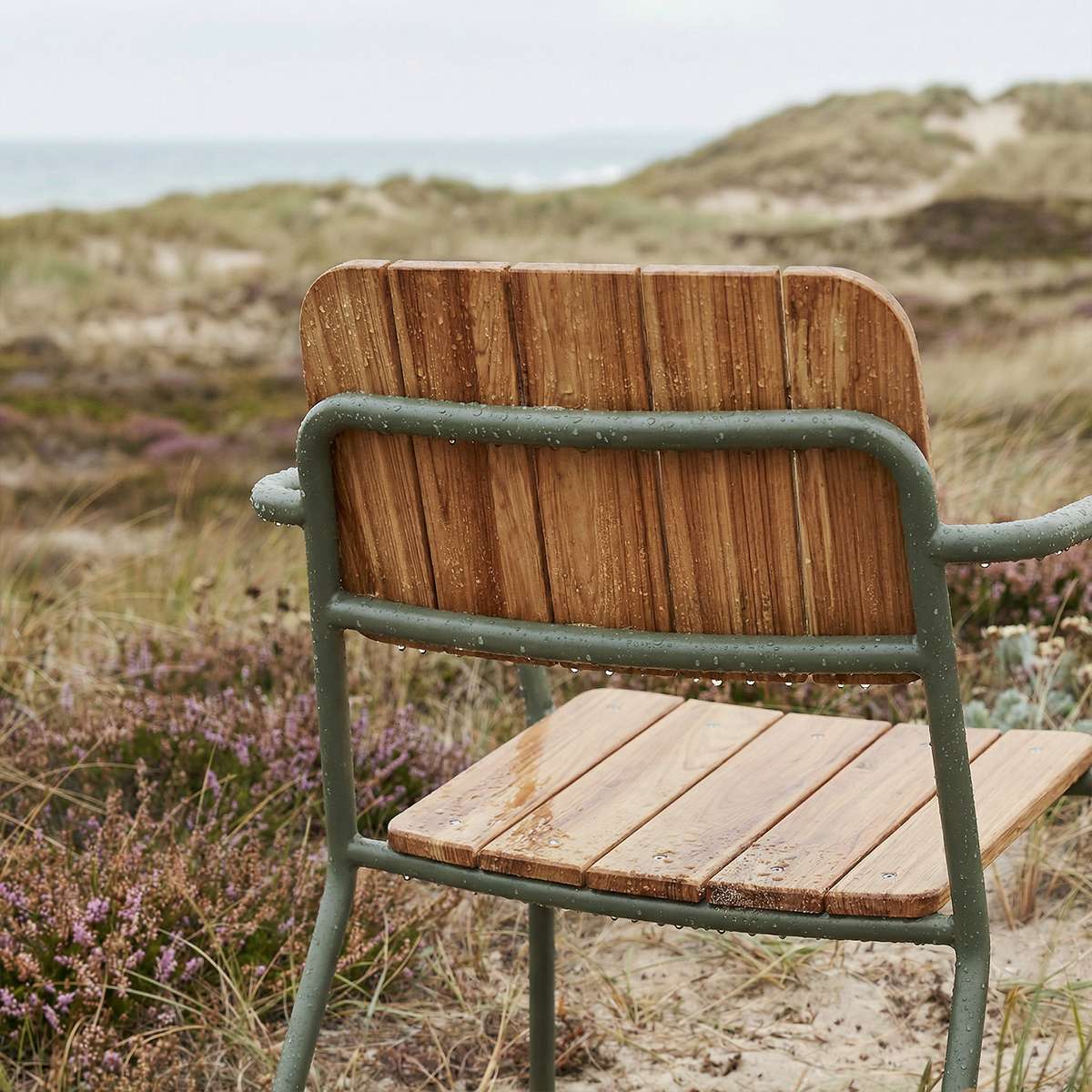 Kirra Patio Lounge Chair in olive with powder-coated aluminum and teak wood, reclined outdoor seating.
