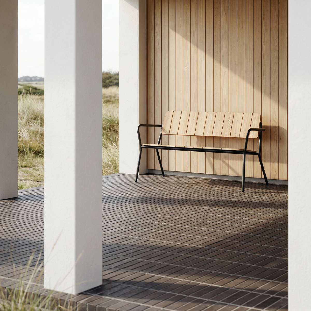Noir Kirra Patio Bench with powder-coated aluminum frame and teak wood seat in outdoor setting
