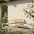 Taupe Kirra Patio Bench with powder-coated aluminum frame and teak wood seat in outdoor setting