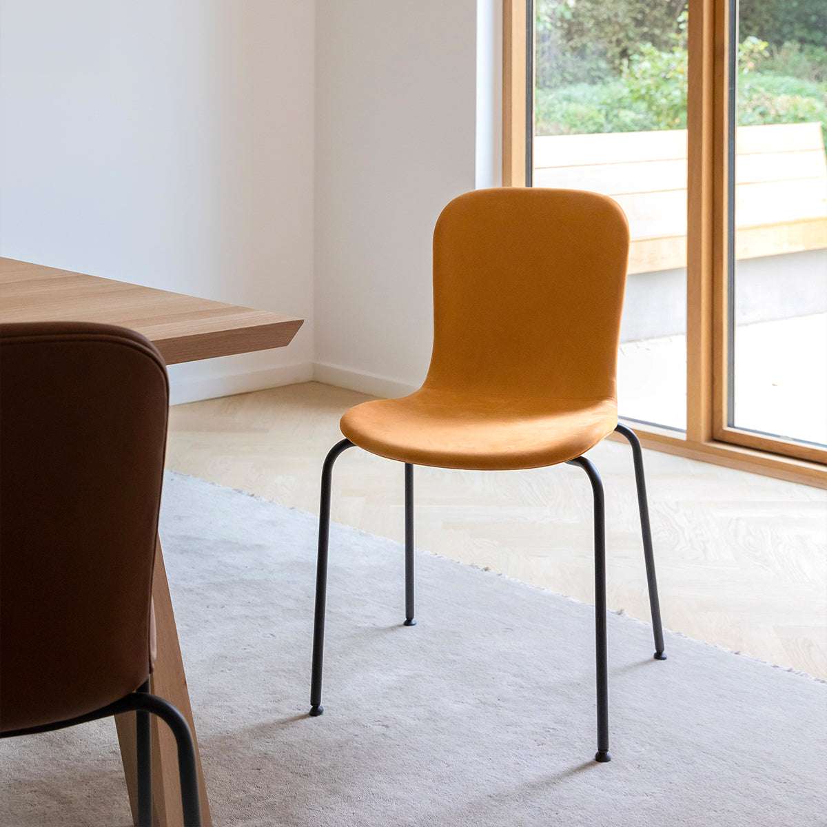 Chair no. One S1 dining chair in Luna Sandstone leather with recycled plastic shell and steel legs
