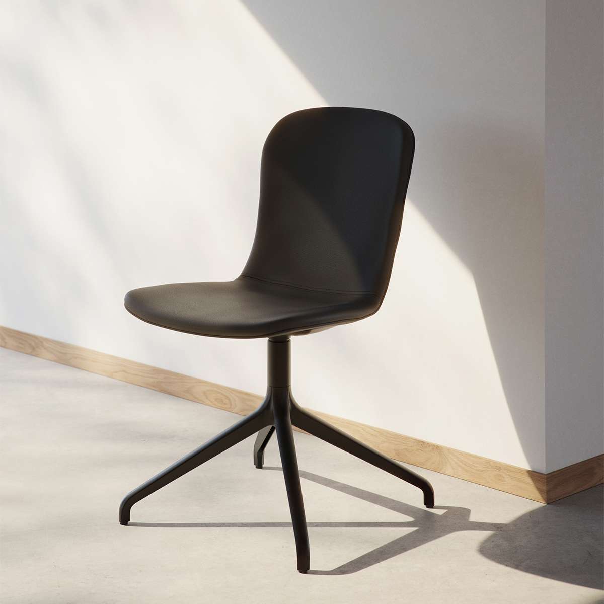 Terra Black Chair no. One S1 with cast aluminum swivel base in a simple indoor dining setting