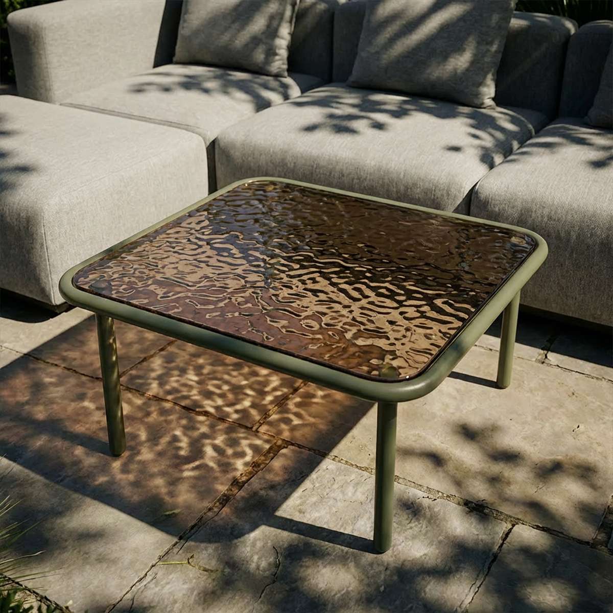 Square Mollis Coffee Table with olive powder-coated aluminum frame and smoked tempered glass top outdoors.