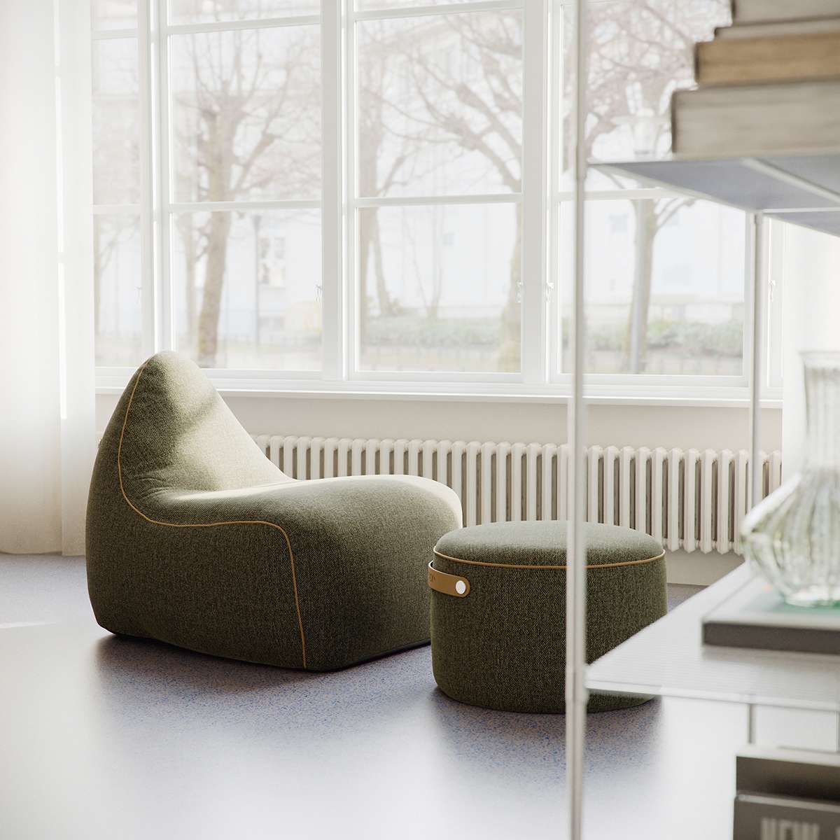 SACKit Chair Indoor in Cosmo Olive fabric with rounded shape and soft contours on a white background