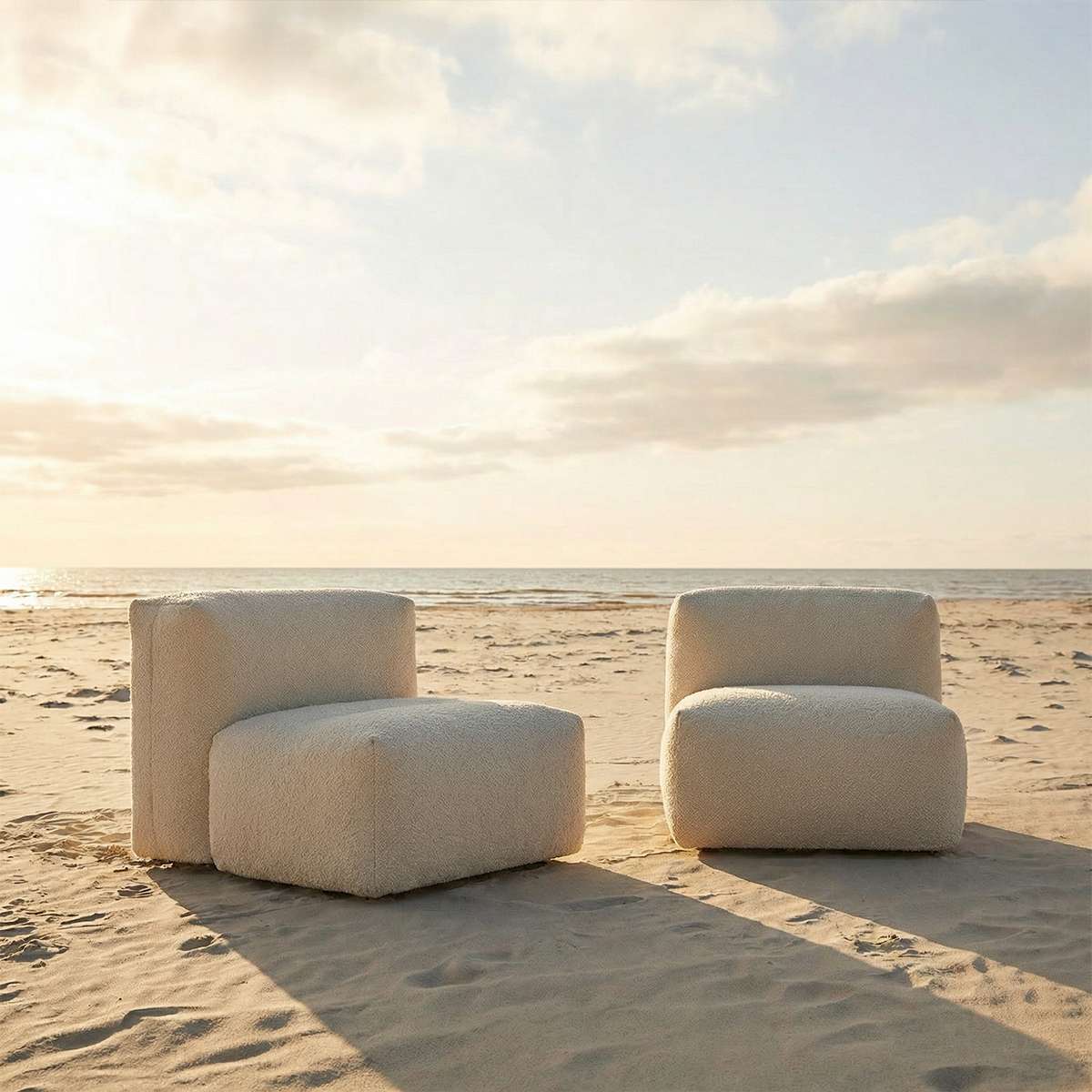 Soft Sofa Outdoor seat in neutral beige boucle fabric placed in a bright setting.