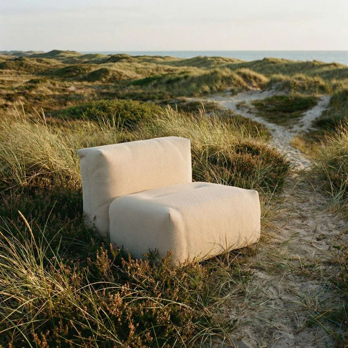 Soft Sofa Outdoor seat in beige boucle fabric, designed for comfortable outdoor living.