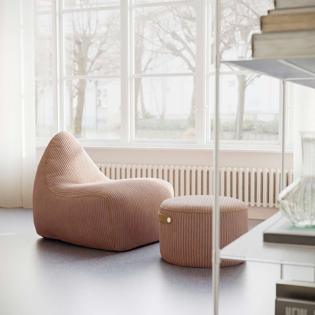SACKit Chair and Pouf Indoor in olive corduroy fabric with soft, rounded shapes on a white background