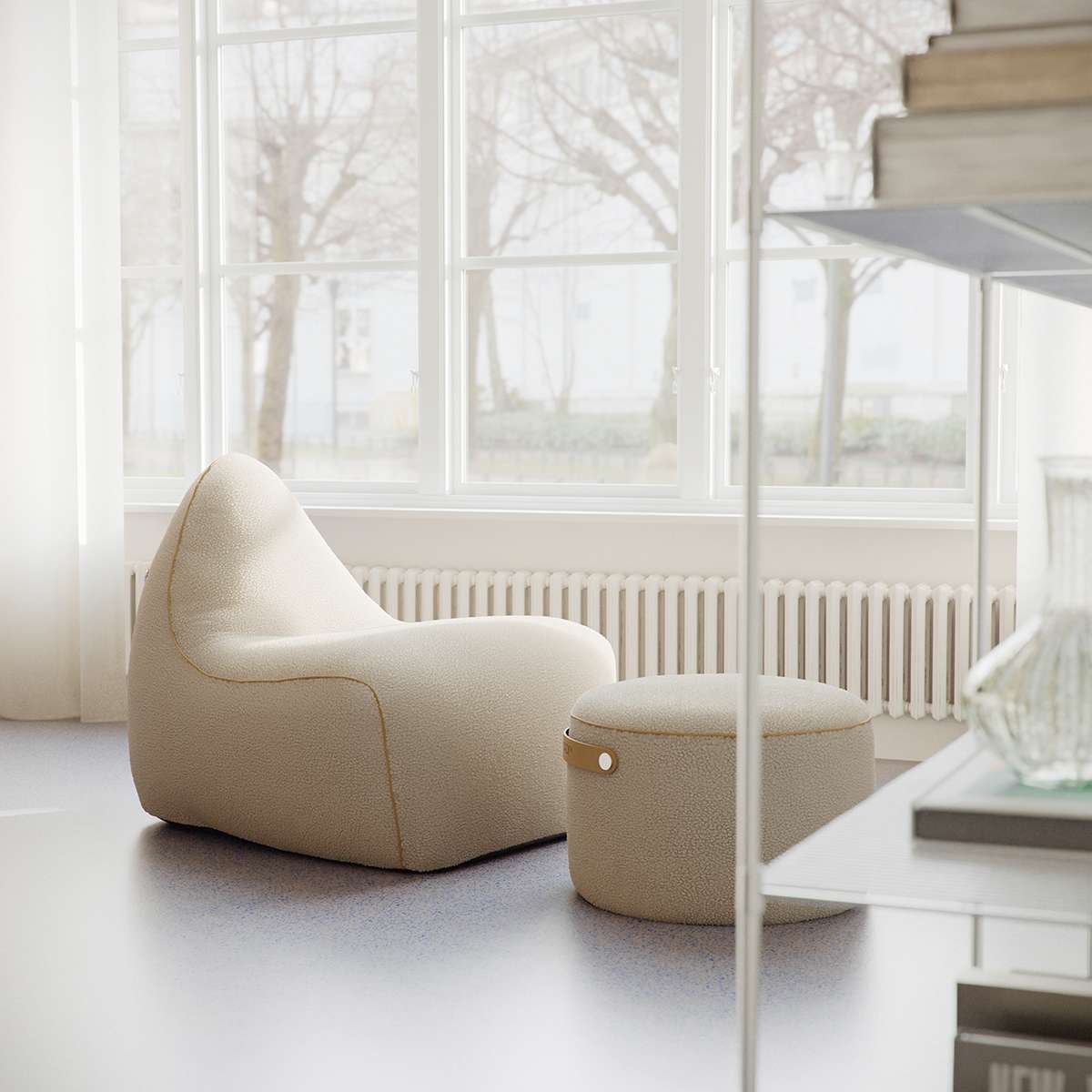 SACKit Chair and Pouf Indoor in Teddy Brown fabric with soft, rounded shapes for cozy seating.