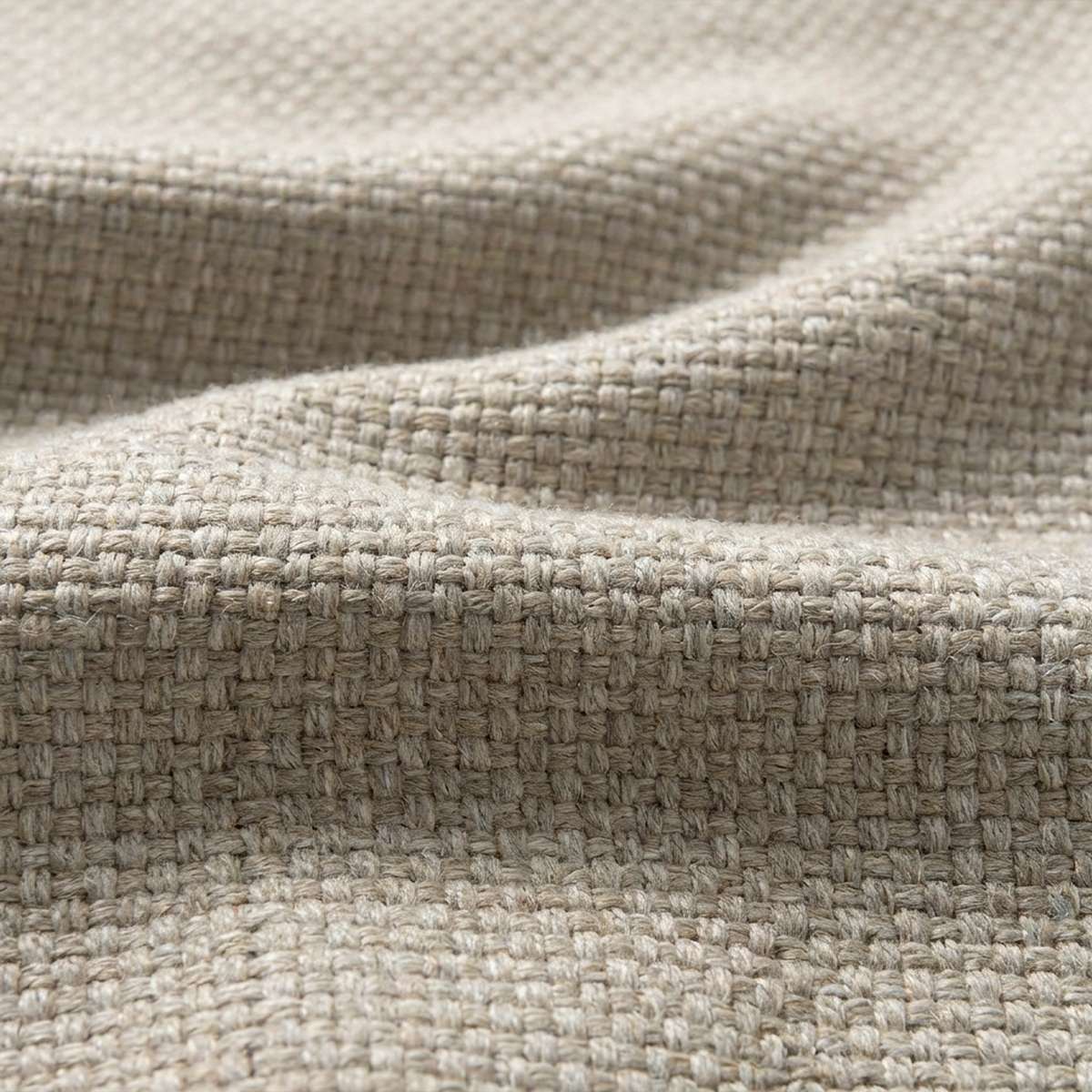 Close up of durable textured outdoor upholstery fabric in a warm neutral tone from sackit Cobana Lounge Sofa collection