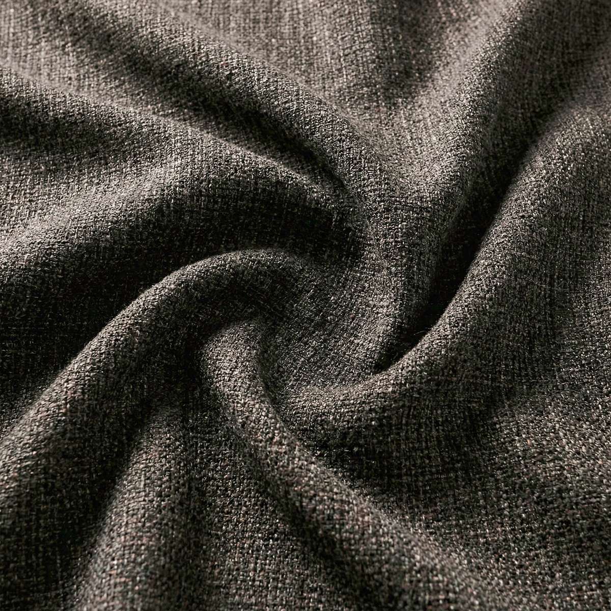 Close up of dark grey textured outdoor upholstery fabric for a sackit Cobana lounge sofa designed in Denmark for weather resistant Nordic living