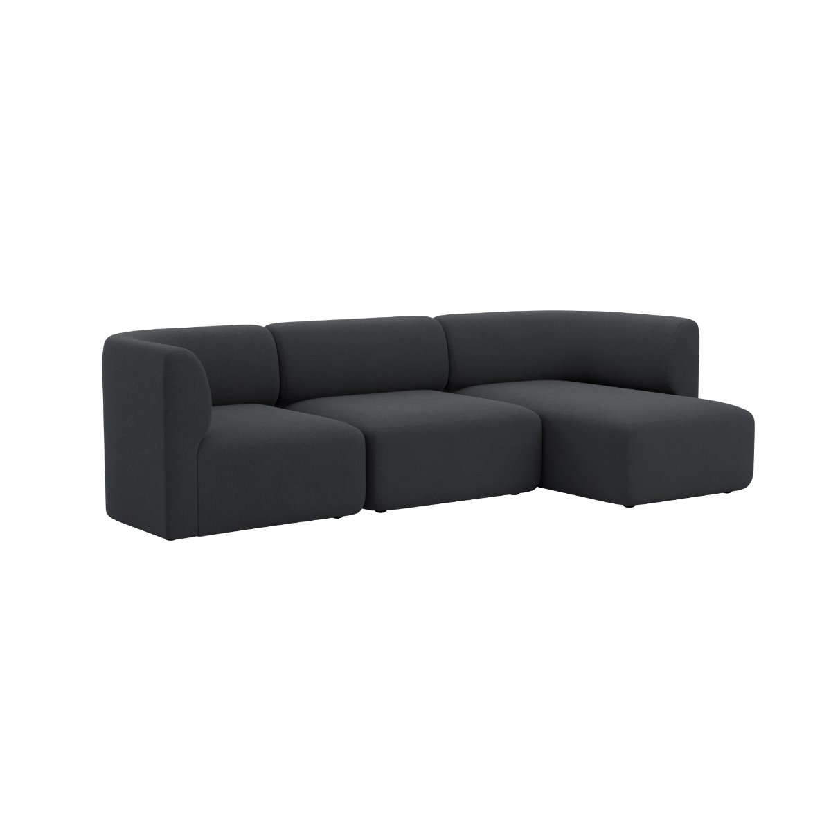Black three seat chaise sofa with a right hand chaise and soft rounded cushions from sackit for calm Scandinavian living spaces