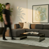 sackit Fjord three seater sofa in a warm Scandinavian living room with cushions coffee table abstract wall art and soft natural light